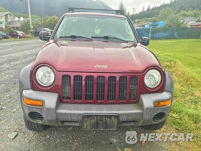 Piąte zdjęcie samochodu w środku: 2003 JEEP LIBERTY SPORT VIN:1J4GL48K53W529524 - miniatura