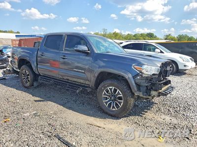 Czwarte zdjęcie samochodu z boku: 2023 TOYOTA TACOMA TRD SPORT VIN:3TMCZ5AN5PM562493 - miniatura