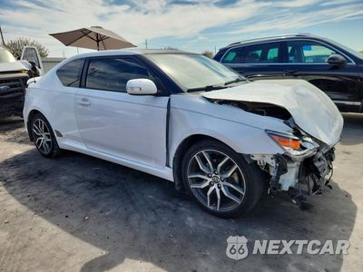 Czwarte zdjęcie samochodu z boku: 2014 SCION TC BASE VIN:JTKJF5C70E3072727 - miniatura