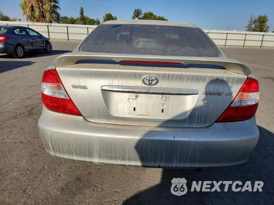 Zdjęcie 6 z 12 samochodu: 2004 TOYOTA CAMRY LE VIN:JTDBE32K040280499 - miniatura