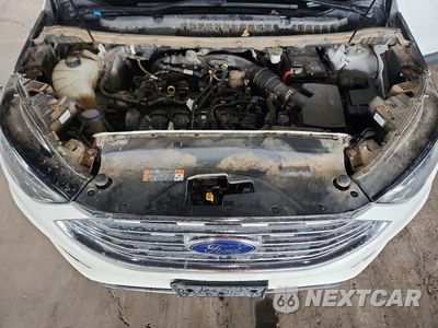 Zdjęcie 12 z 13 samochodu: 2020 FORD EDGE SEL VIN:2FMPK3J96LBA50262 - miniatura