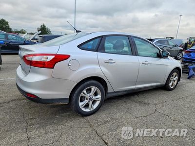 Trzecie zdjęcie samochodu z tyłu: 2013 FORD FOCUS SE VIN:1FADP3F21DL289617 - miniatura