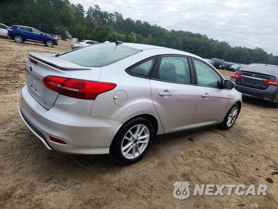 Trzecie zdjęcie samochodu z tyłu: 2018 FORD FOCUS SE VIN:1FADP3F2XJL279888 - miniatura