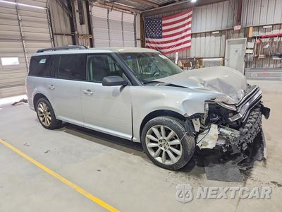 Czwarte zdjęcie samochodu z boku: 2016 FORD FLEX SE VIN:2FMGK5B81GBA15782 - miniatura
