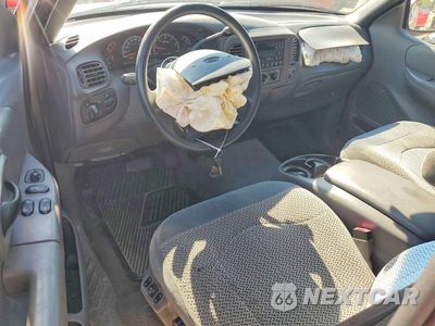 Zdjęcie 8 z 12 samochodu: 2000 FORD F150 VIN:1FTRX17L4YNB61846 - miniatura