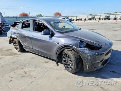 Czwarte zdjęcie samochodu z boku: 2024 TESLA MODEL Y VIN:7SAYGDEE5RA238841 - miniatura