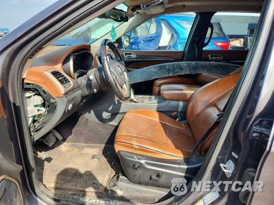 Zdjęcie 7 z 14 samochodu: 2016 JEEP GRAND CHEROKEE SUMMIT VIN:1C4RJFJM5GC372886 - miniatura