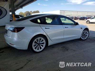 Trzecie zdjęcie samochodu z tyłu: 2021 TESLA MODEL 3 VIN:5YJ3E1EA6MF996059 - miniatura