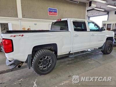 Trzecie zdjęcie samochodu z tyłu: 2016 CHEVROLET SILVERADO K1500 LT VIN:1GCUKREC6GF138846 - miniatura