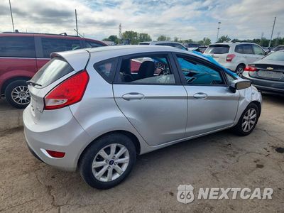 Trzecie zdjęcie samochodu z tyłu: 2011 FORD FIESTA SE VIN:3FADP4EJ3BM116367 - miniatura