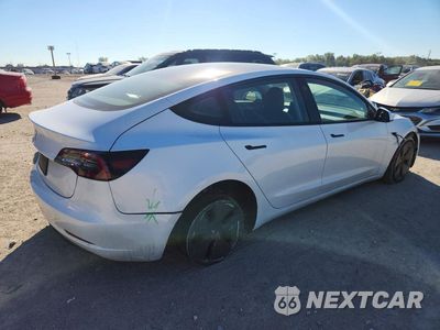 Trzecie zdjęcie samochodu z tyłu: 2023 TESLA MODEL 3 VIN:5YJ3E1EA9PF479696 - miniatura