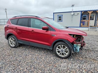 Czwarte zdjęcie samochodu z boku: 2018 FORD ESCAPE SEL VIN:1FMCU0HD3JUD04700 - miniatura