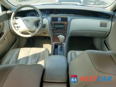 Zdjęcie 8 z 12 samochodu: 2002 TOYOTA AVALON XLS VIN:4T1BF28B12U263114 - miniatura