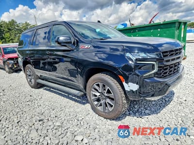 Czwarte zdjęcie samochodu z boku: 2021 CHEVROLET TAHOE K1500 Z71 VIN:1GNSKPKD0MR378713 - miniatura