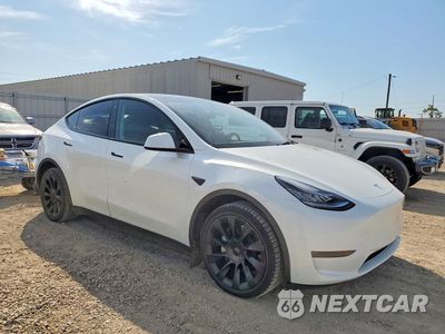 Czwarte zdjęcie samochodu z boku: 2023 TESLA MODEL Y VIN:7SAYGDEE7PA065353 - miniatura