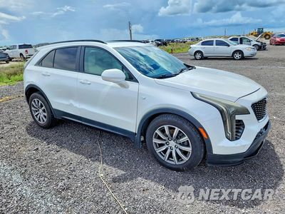 Czwarte zdjęcie samochodu z boku: 2019 CADILLAC XT4 SPORT VIN:1GYFZFR47KF199888 - miniatura
