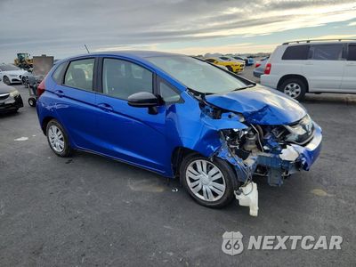 Czwarte zdjęcie samochodu z boku: 2016 HONDA FIT LX VIN:JHMGK5H53GS003574 - miniatura