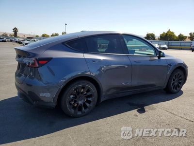 Trzecie zdjęcie samochodu z tyłu: 2023 TESLA MODEL Y VIN:7SAYGDEE0PF883378 - miniatura