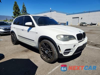 Czwarte zdjęcie samochodu z boku: 2011 BMW X5 XDRIVE35D VIN:5UXZW0C59BL371039 - miniatura