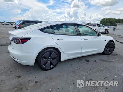 Trzecie zdjęcie samochodu z tyłu: 2021 TESLA MODEL 3 VIN:5YJ3E1EB4MF988387 - miniatura