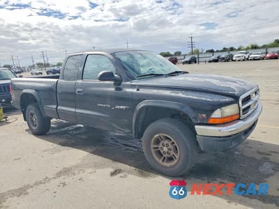 Czwarte zdjęcie samochodu z boku: 2000 DODGE DAKOTA VIN:1B7GG22X8YS584549 - miniatura