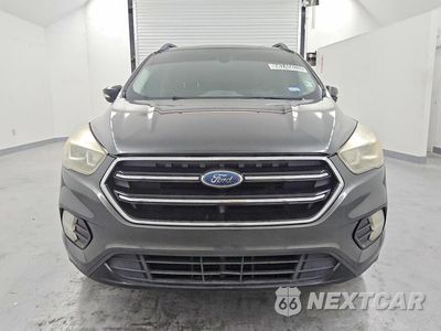 Piąte zdjęcie samochodu w środku: 2017 FORD ESCAPE TITANIUM VIN:1FMCU0JD4HUA22702 - miniatura