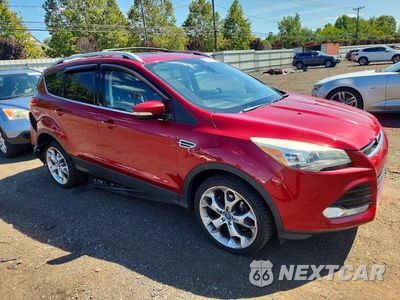 Czwarte zdjęcie samochodu z boku: 2015 FORD ESCAPE TITANIUM VIN:1FMCU9J98FUB35176 - miniatura