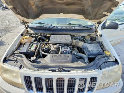Zdjęcie 12 z 13 samochodu: 2002 JEEP GRAND CHEROKEE LIMITED VIN:1J8GW58J22C272597 - miniatura