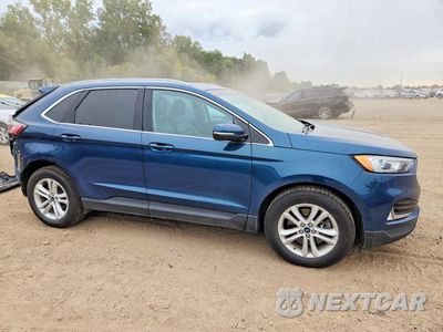 Czwarte zdjęcie samochodu z boku: 2020 FORD EDGE SEL VIN:2FMPK4J98LBA68462 - miniatura