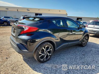 Trzecie zdjęcie samochodu z tyłu: 2021 TOYOTA C-HR XLE VIN:JTNKHMBX3M1111298 - miniatura