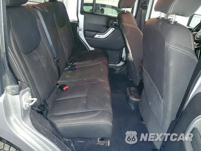 Zdjęcie 11 z 14 samochodu: 2013 JEEP WRANGLER UNLIMITED SAHARA VIN:1C4BJWEGXDL693839 - miniatura