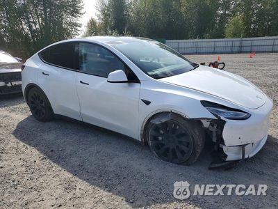Czwarte zdjęcie samochodu z boku: 2022 TESLA MODEL Y VIN:7SAYGDEE8NF320477 - miniatura