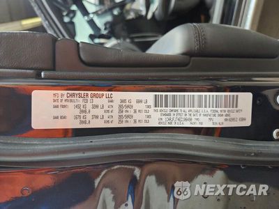 Zdjęcie 13 z 13 samochodu: 2014 JEEP GRAND CHEROKEE SUMMIT VIN:1C4RJFJT4EC106490 - miniatura