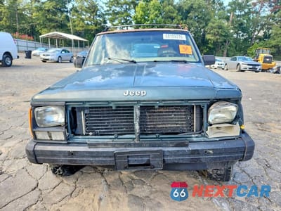 Piąte zdjęcie samochodu w środku: 1994 JEEP CHEROKEE SPORT VIN:1J4FJ68SXRL148162 - miniatura