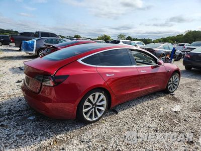 Trzecie zdjęcie samochodu z tyłu: 2018 TESLA MODEL 3 VIN:5YJ3E1EA8JF015502 - miniatura