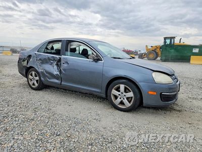Czwarte zdjęcie samochodu z boku: 2009 VOLKSWAGEN JETTA SE VIN:3VWRM71K49M062755 - miniatura