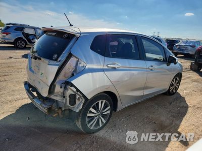 Trzecie zdjęcie samochodu z tyłu: 2016 HONDA FIT EX VIN:JHMGK5H71GX041969 - miniatura