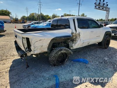 Trzecie zdjęcie samochodu z tyłu: 2020 TOYOTA TACOMA TRD OFF-ROAD VIN:5TFCZ5AN7LX215946 - miniatura