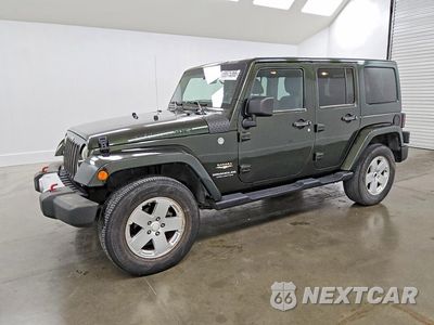 2011 JEEP WRANGLER UNLIMITED SAHARA 1J4BA5H16BL575604 - główne zdjęcie licytacji z USA - miniatura