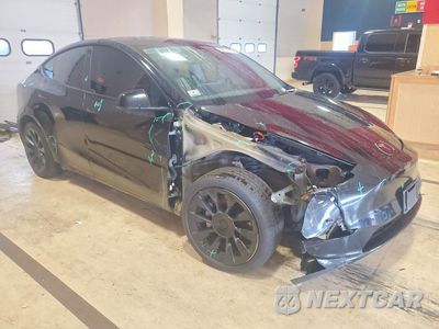 Czwarte zdjęcie samochodu z boku: 2022 TESLA MODEL Y VIN:7SAYGAEE1NF379367 - miniatura