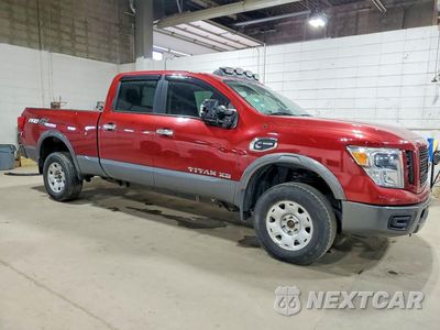 Czwarte zdjęcie samochodu z boku: 2017 NISSAN TITAN XD PRO-4X VIN:1N6BA1F45HN567211 - miniatura