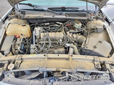 Zdjęcie 11 z 12 samochodu: 2001 BUICK LESABRE CUSTOM VIN:1G4HP54KX1U295895 - miniatura