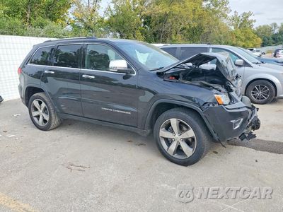 Czwarte zdjęcie samochodu z boku: 2014 JEEP GRAND CHEROKEE LIMITED VIN:1C4RJFBG3EC340024 - miniatura
