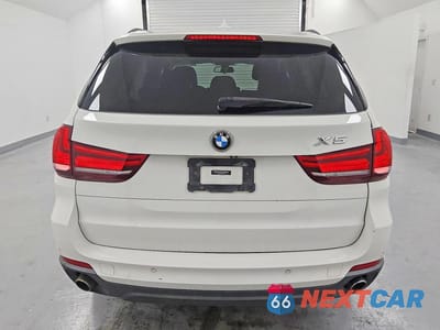 Zdjęcie 6 z 13 samochodu: 2014 BMW X5 SDRIVE35I VIN:5UXKR2C53E0H32214 - miniatura