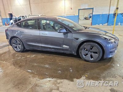 Czwarte zdjęcie samochodu z boku: 2022 TESLA MODEL 3 VIN:5YJ3E1EA9NF369728 - miniatura