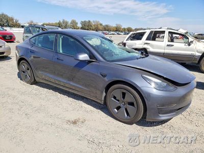 Czwarte zdjęcie samochodu z boku: 2023 TESLA MODEL 3 VIN:5YJ3E1EB9PF387531 - miniatura