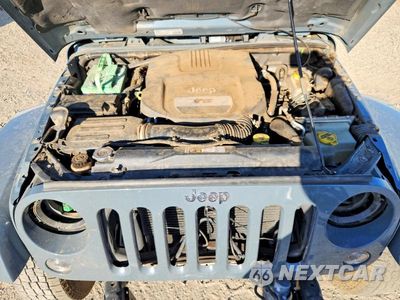Zdjęcie 11 z 12 samochodu: 2014 JEEP WRANGLER UNLIMITED SAHARA VIN:1C4HJWEGXEL196494 - miniatura