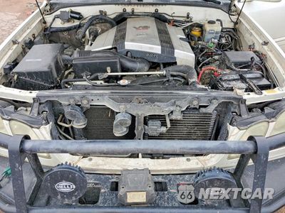 Zdjęcie 12 z 13 samochodu: 2003 LEXUS LX 470 VIN:JTJHT00W433535198 - miniatura