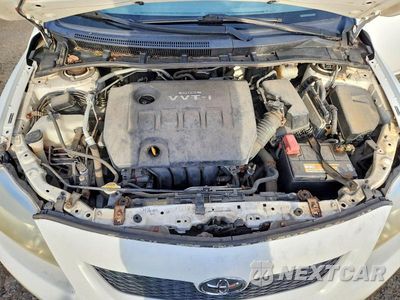 Zdjęcie 11 z 12 samochodu: 2010 TOYOTA COROLLA LE VIN:JTDBU4EE4A9096916 - miniatura