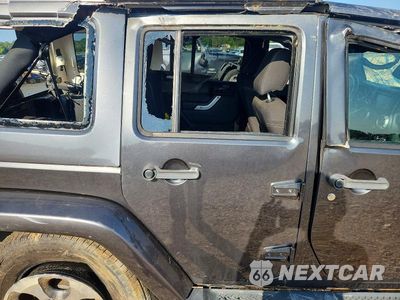 Zdjęcie 10 z 12 samochodu: 2017 JEEP WRANGLER UNLIMITED SAHARA VIN:1C4BJWEG3HL511422 - miniatura